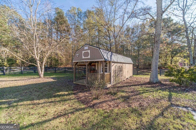 view of outdoor structure featuring a yard