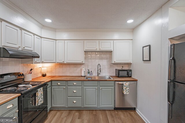 115 Lucian Cir, Savannah, GA 31406 - kitchen with black appliances, under cabinet range hood, butcher block countertops, a sink, and gray cabinets