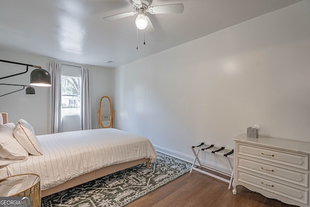 115 Lucian Cir, Savannah, GA 31406 - bedroom with dark wood-style floors, baseboards, and ceiling fan