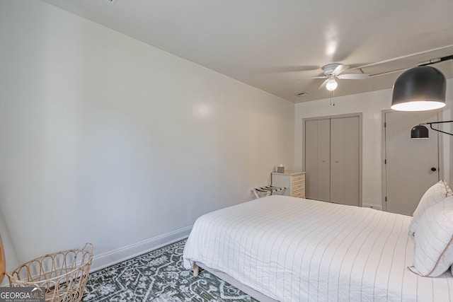 115 Lucian Cir, Savannah, GA 31406 - bedroom featuring baseboards, a closet, carpet floors, and a ceiling fan