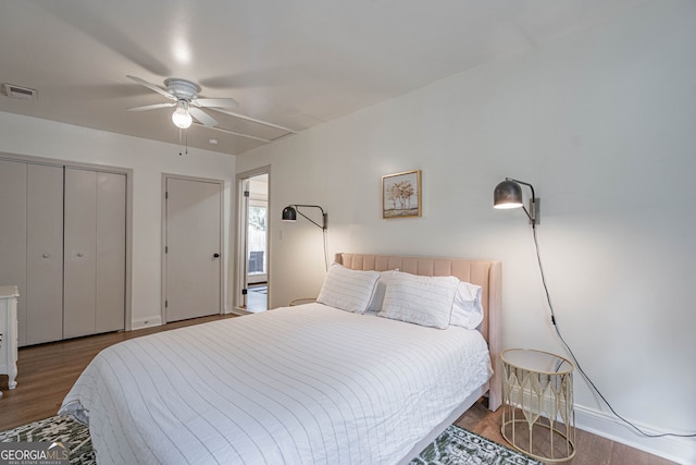 115 Lucian Cir, Savannah, GA 31406 - bedroom with wood finished floors, baseboards, ceiling fan, and attic access