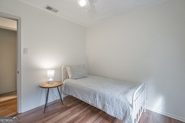 115 Lucian Cir, Savannah, GA 31406 - bedroom featuring baseboards, wood finished floors, and a ceiling fan