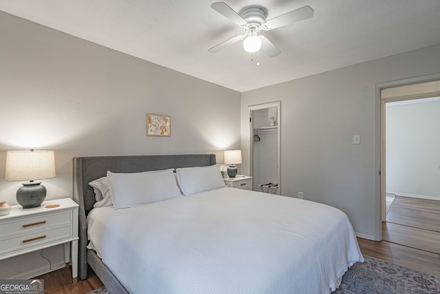 115 Lucian Cir, Savannah, GA 31406 - bedroom featuring dark wood-type flooring, a ceiling fan, a closet, and baseboards