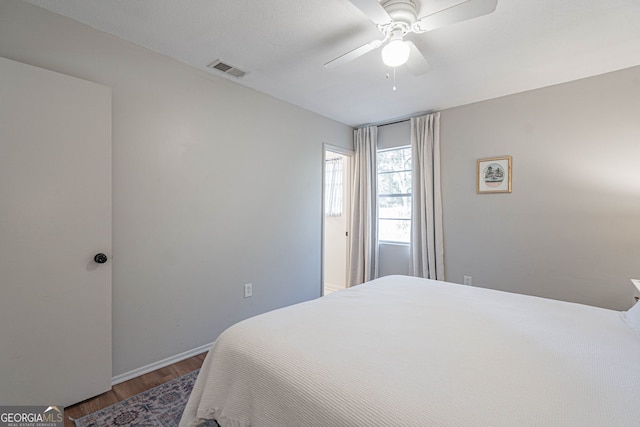 115 Lucian Cir, Savannah, GA 31406 - bedroom with wood finished floors, baseboards, and ceiling fan
