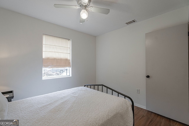 115 Lucian Cir, Savannah, GA 31406 - bedroom with dark wood-style flooring and ceiling fan