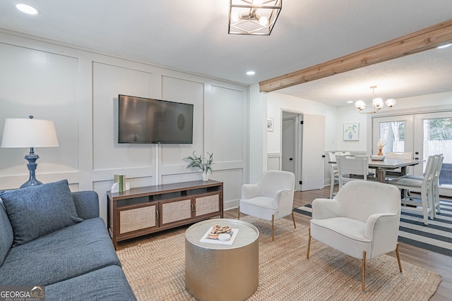 115 Lucian Cir, Savannah, GA 31406 - living area featuring a decorative wall, a chandelier, light wood-style flooring, recessed lighting, and beamed ceiling