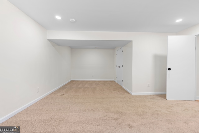 basement with light carpet