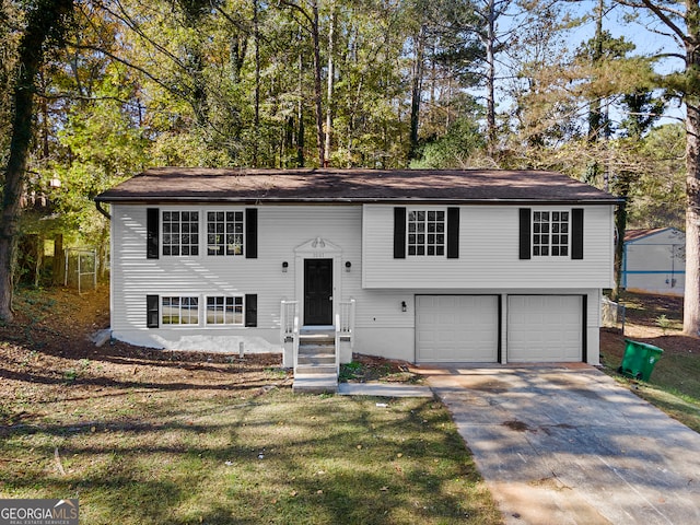 split foyer home featuring a garage