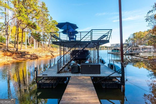 view of dock with a water view