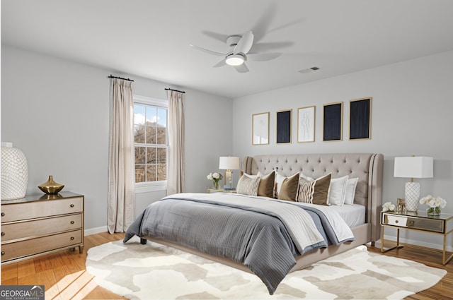 bedroom featuring ceiling fan and light hardwood / wood-style floors