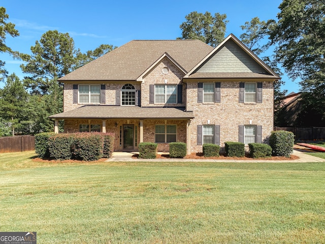 view of front facade featuring a front yard