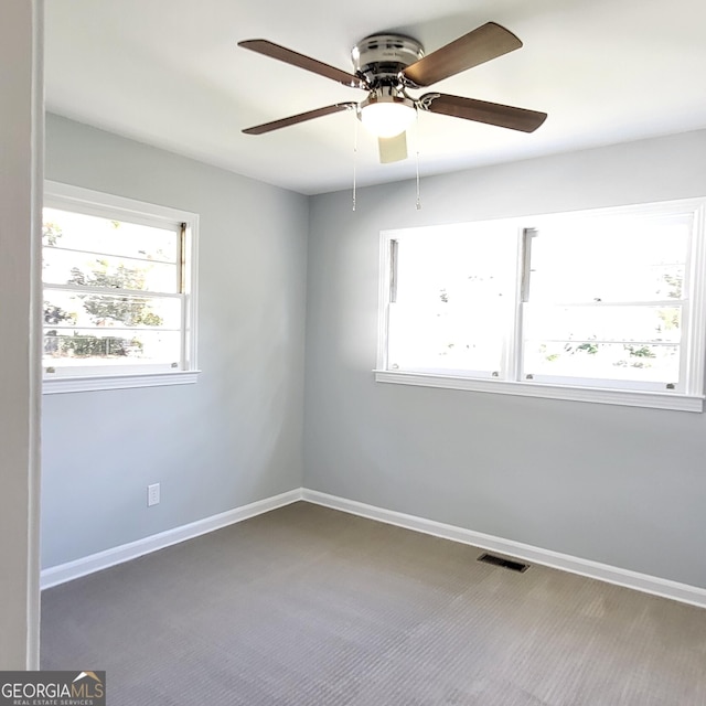 unfurnished bedroom featuring carpet flooring, ceiling fan, ornamental molding, and a closet