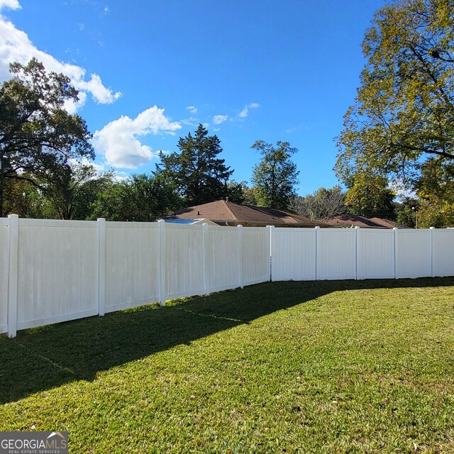 view of yard featuring central AC