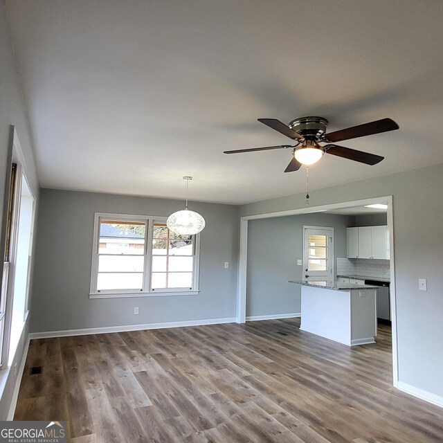 hallway featuring dark wood-type flooring