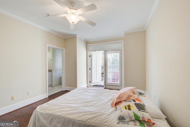 bedroom featuring ornamental molding, ensuite bathroom, ceiling fan, and dark wood-type flooring