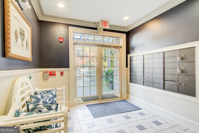 entryway featuring mail boxes and ornamental molding