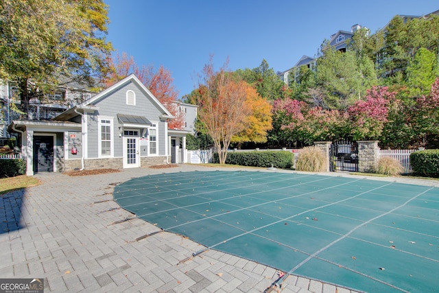 view of pool featuring a patio