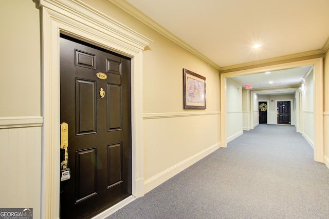 hall featuring light carpet and ornamental molding