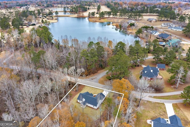 drone / aerial view with a water view