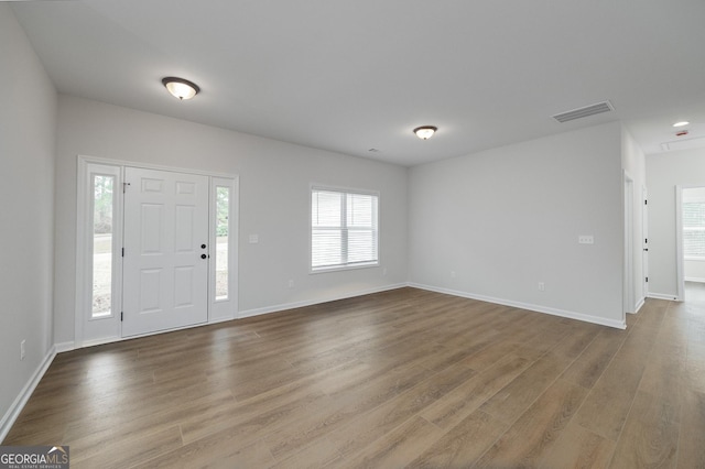 entrance foyer featuring hardwood / wood-style floors