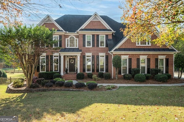 view of front of house with a front yard