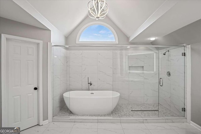 bathroom with separate shower and tub, lofted ceiling, and an inviting chandelier