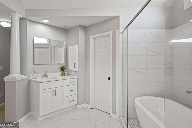 bathroom with vanity, decorative columns, and separate shower and tub