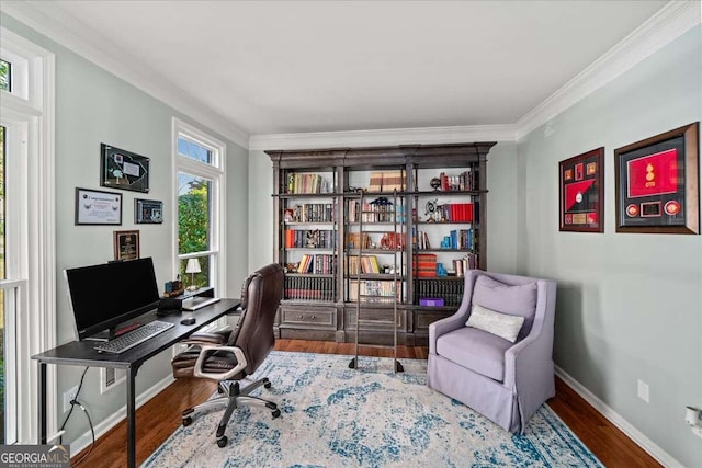 office with hardwood / wood-style flooring and ornamental molding