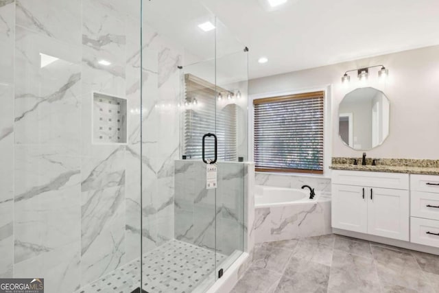 bathroom featuring crown molding and independent shower and bath