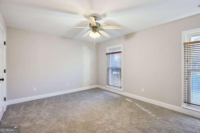 unfurnished bedroom with ceiling fan, a closet, and light carpet