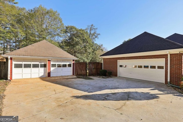 view of front facade with a garage and a front lawn