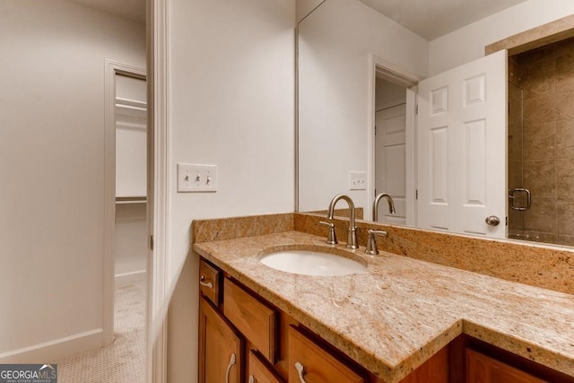 bathroom with tile patterned flooring and vanity