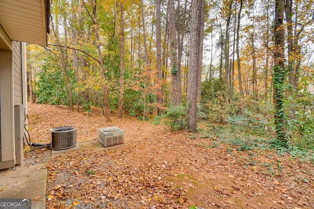 view of yard featuring central AC unit