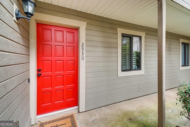 entrance to property with covered porch