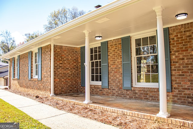 doorway to property with a porch