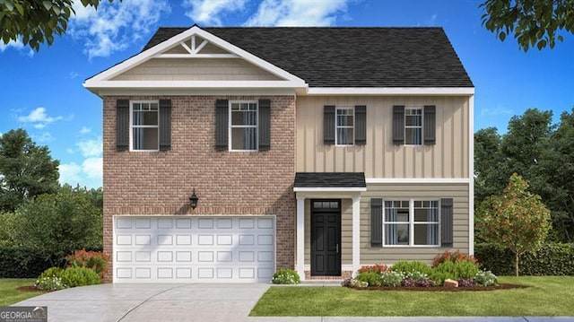 view of front of property featuring a front yard and a garage