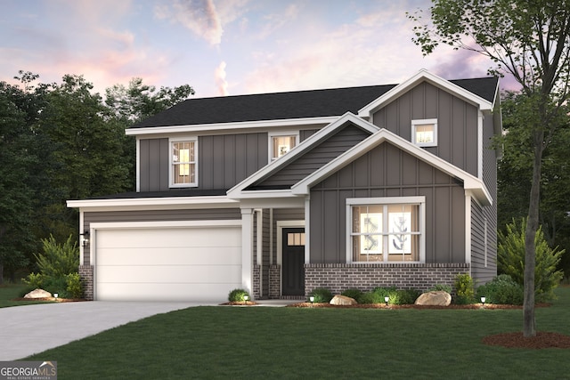 view of front facade featuring driveway, brick siding, board and batten siding, and a lawn