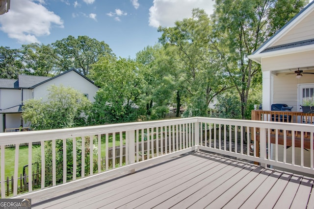 wooden deck with ceiling fan