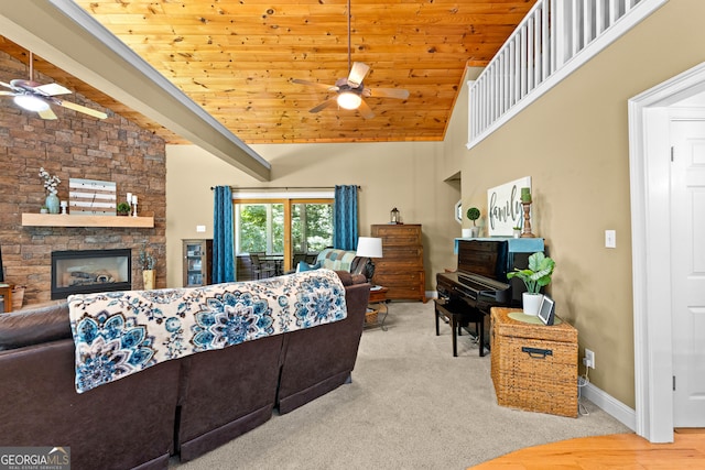 living room featuring a stone fireplace, light carpet, high vaulted ceiling, and wood ceiling