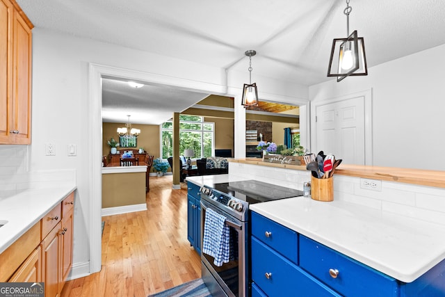 kitchen featuring an inviting chandelier, tasteful backsplash, light hardwood / wood-style flooring, electric stove, and light brown cabinetry