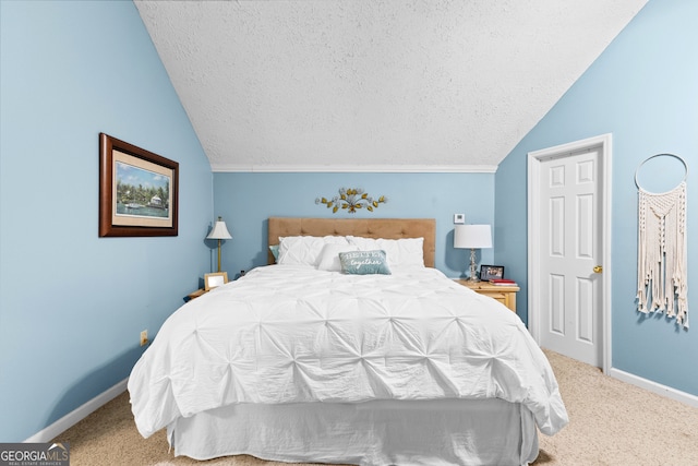 bedroom featuring carpet, a textured ceiling, and vaulted ceiling