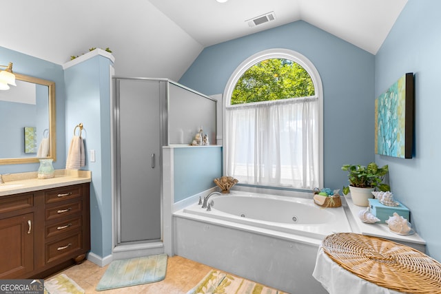 bathroom with separate shower and tub, tile patterned flooring, vanity, and lofted ceiling