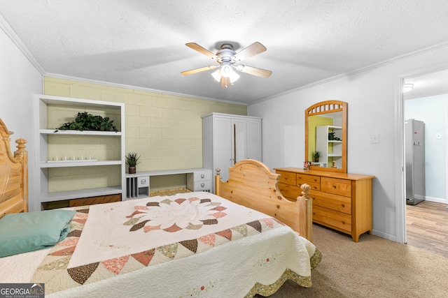 bedroom with ceiling fan, stainless steel fridge, crown molding, and a textured ceiling