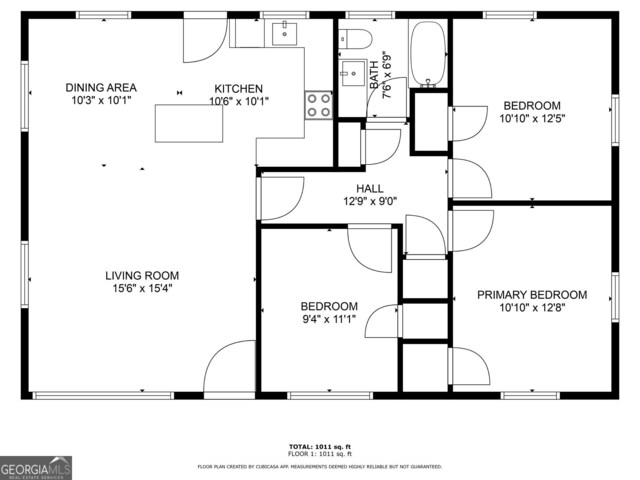 single story home featuring a front yard and a wooden deck