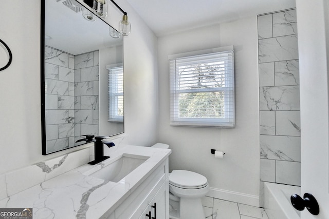 full bathroom with vanity, tub / shower combination, toilet, and a healthy amount of sunlight