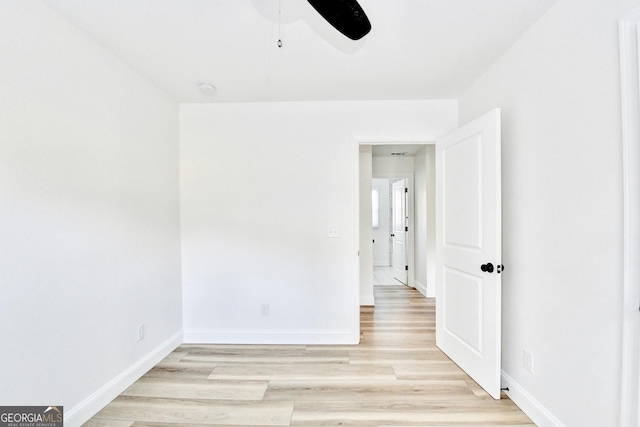 unfurnished room with light hardwood / wood-style floors and ceiling fan