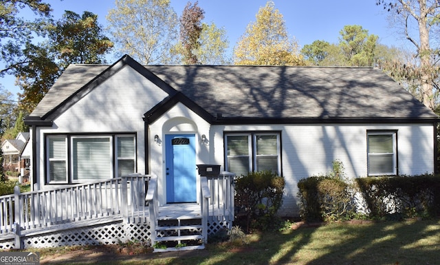 view of front of house featuring a wooden deck