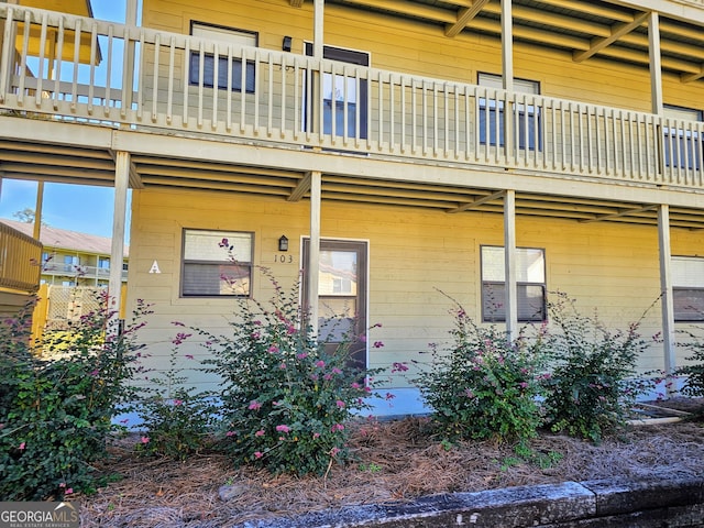 exterior space featuring a balcony