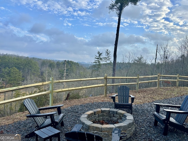 view of yard featuring a fire pit