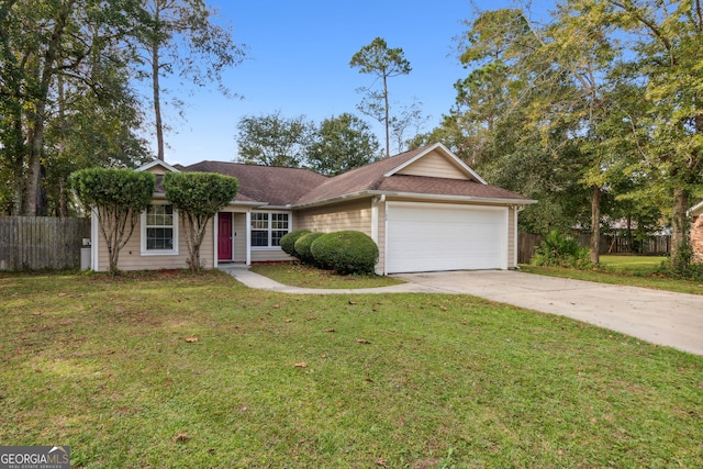 view of front facade with a garage and a front lawn